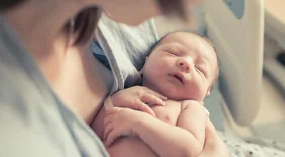 mum with newborn baby in hospital