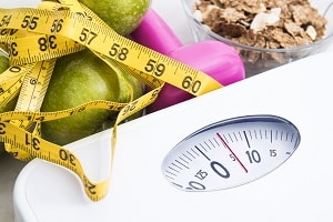 Scale with weight and cereal bowl