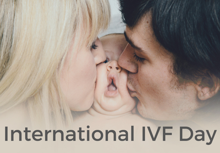 Celebrating Internation IVF day at a cost that's affordable baby getting squished and kissed by mum and dad
